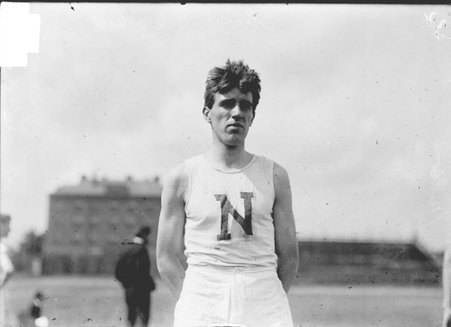 Athlete, F. Nelson, North Division High School, standing at Marshall Field - Chicago Daily News, Inc.