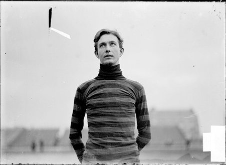 Athlete, Post, University of Wisconsin, standing at Marshall Field - Chicago Daily News, Inc.