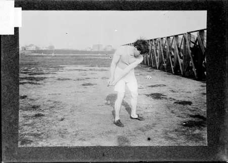 Photograph of athlete, H. L. Thomas, Purdue University, hammer throwing - Chicago Daily News, Inc.