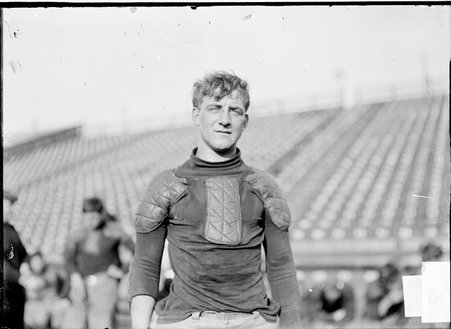 Football player, Spidell, University of Chicago, standing at Marshall Field - Chicago Daily News, Inc.