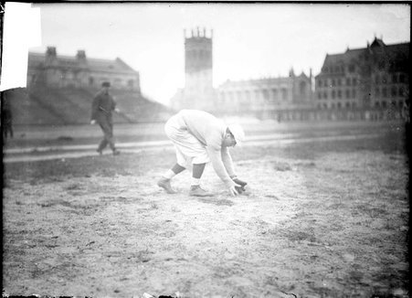 Baseball player, Walter Eckersall, leaning over as if fielding a ground ball, Marshall Field - Chicago Daily News, Inc.