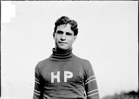 Football player, Captain Harris, Hyde Park, standing outdoors - Chicago Daily News, Inc.