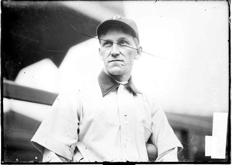 Baseball player, Otis Clymer, Pittsburgh Pirates, outfielder, standing near the grandstand, South Side Park - Chicago Daily News, Inc.