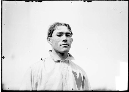 Baseball player, Jim Mullin, Washington Senators standing outdoors - Chicago Daily News, Inc.