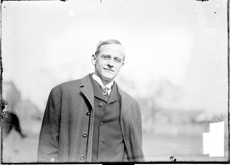 Athlete, E. C. Dvorak, University of Michigan, facing the camera, standing outdoors - Chicago Daily News, Inc.