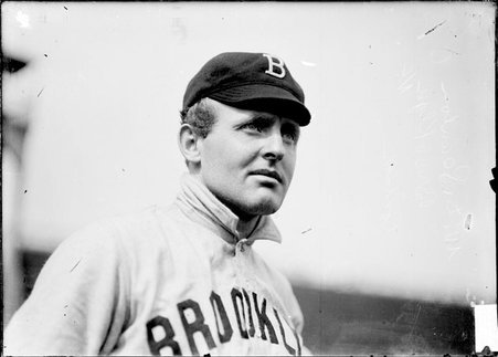 Baseball player, Doc Scanlon, Brooklyn Superbas, standing on ballpark field - Chicago Daily News, Inc.