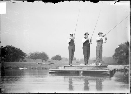 Fly casting, E. A. Snell, W. J. Jameson, and E. R. Letterman, pulling in their lines - Chicago Daily News, Inc.