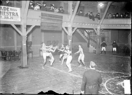 Basketball, player shooting in the key, defensive player blocking - Chicago Daily News, Inc.