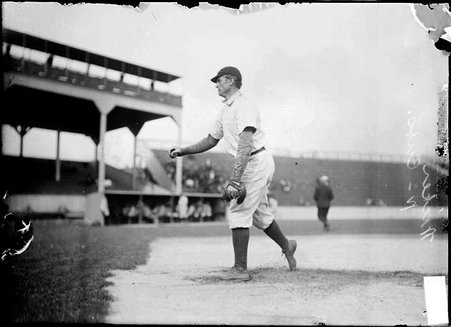 Baseball player, Bob Wicker, Chicago Cubs, throwing a ball, warming up on field - Chicago Daily News, Inc.