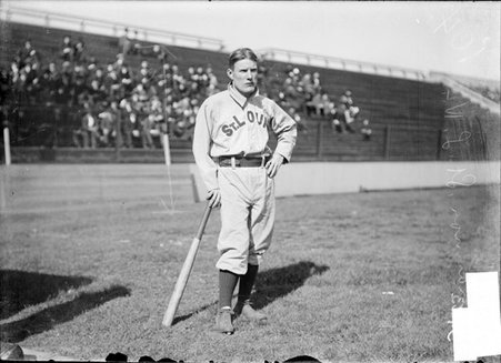 Baseball player, Spike Shannon, St. Louis Cardinals, leaning on bat - Chicago Daily News, Inc.