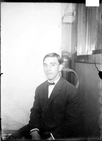 Pugilist, Kid Herman, sitting in a chair - Chicago Daily News, Inc.