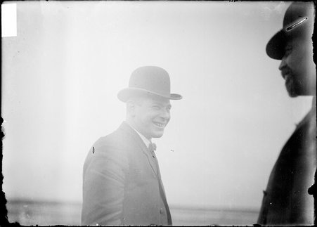 Unidentified man attending the harness racing at the West Side Club - Chicago Daily News, Inc.
