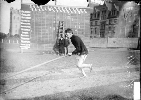 Athlete, Knox, pole vaulting, running the approach at Marshall Field - Chicago Daily News, Inc.