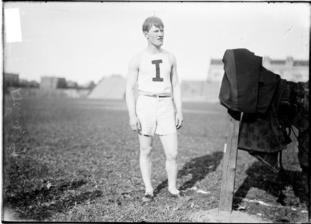 Athlete, E. Davis of Iowa, standing on the field at Marshall Field - Chicago Daily News, Inc.