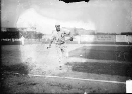 Baseball player, George Rohe, Chicago White Sox, running toward a ball near the third base line, South Side Park - Chicago Daily News, Inc.