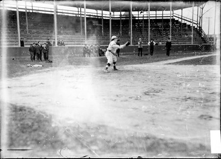 Gunthers baseball player Chick Fraser, reaching to catch a ball on a baseball field - Chicago Daily News, Inc.