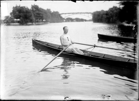 Rower Fletcher Dobyns of the Iroquois Club, rowing a scull on the lagoon in Lincoln Park - Chicago Daily News, Inc.