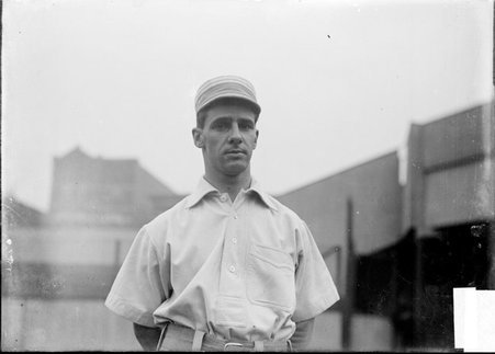 Baseball player, Gurry, Chicago Cubs, standing on the field at West Side Grounds, image includes Gurry's belt and the top of his pants - Chicago Daily News, Inc.