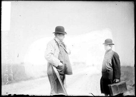Horseman, Steve LaHommedien, standing with an unidentified man on a roadside - Chicago Daily News, Inc.