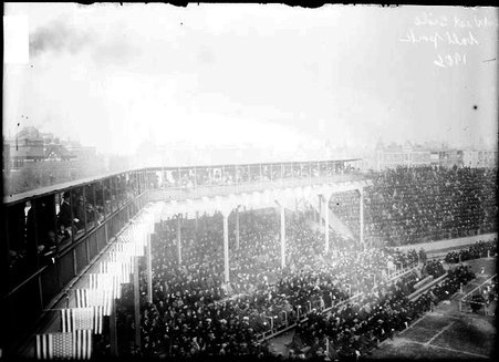 West Side Grounds, spectators are sitting in grandstands and bleachers on the field and to left of the field - Chicago Daily News, Inc.