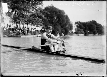 Lincoln Park Rowing Club member Dr. McDowell, rowing in a scull on the water in Lincoln Park in the Lincoln Park community area - Chicago Daily News, Inc.