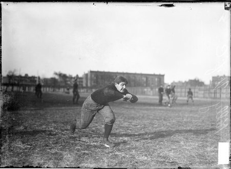 University of Chicago football player Kelly, posing in a blocking position at Marshall Field - Chicago Daily News, Inc.