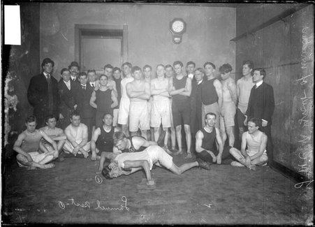 Wrestlers, YMCA, gathered in gymnasium - Chicago Daily News, Inc.