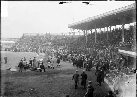 Spectators filling stands and seating areas set up on edges of the field at South Side Park, view from the stands right of home plate - Chicago Daily News, Inc.