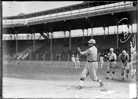 Cleveland Naps baseball player Congalton, following through after swinging a bat, standing at home plate at South Side Park - Chicago Daily News, Inc.