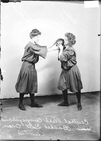 Central Park Congregational girls' basketball players Hale and Bellows, posing in front of a backdrop - Chicago Daily News, Inc.