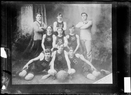 Photograph of Bessemer junior basketball players, posing in a room - Chicago Daily News, Inc.