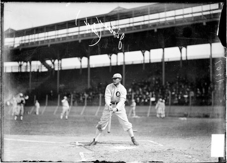 White Sox baseball player Fielder Jones, holding a l bat, standing in a batting stance at home plate on the field at South Side Park - Chicago Daily News, Inc.