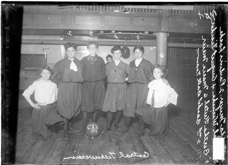 Central Turnverein 2nd team girls' basketball players Meyer, Laske, Wieneke, Fischer, Keitel, and Meyer posing in a gymnasium - Chicago Daily News, Inc.