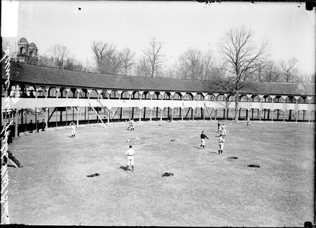 Chicago Cubs baseball players, throwing baseballs, standing on the field at West Baden - Chicago Daily News, Inc.