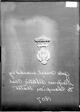 Gold Medal awarded by Sleipner Athletic Club in Chicago, Illinois, to the Champion Skater in1907 - Chicago Daily News, Inc.