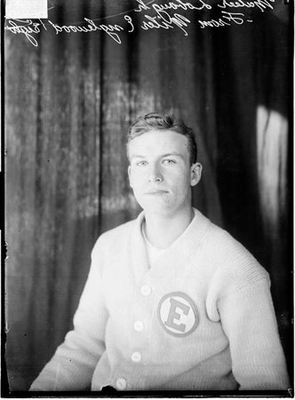 Englewood High School athlete Maleer Lobaugh, sitting in front of a dark backdrop - Chicago Daily News, Inc.
