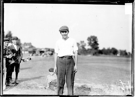 Golfer, R. S. Salter, standing on the grounds of an unidentified golf course - Chicago Daily News, Inc.