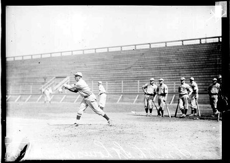 St. Louis Browns baseball player, Wib Smith, following through after swinging a bat, standing at home plate at South Side Park - Chicago Daily News, Inc.