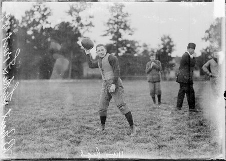 Football player, B. West, Lake Forest University, about to throw football - Chicago Daily News, Inc.