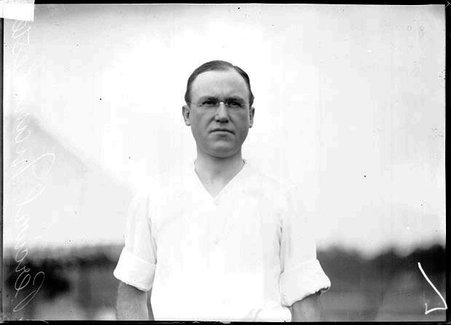 Golfer, Percival Manchester, standing outdoors - Chicago Daily News, Inc.