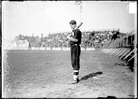 Baseball player, Ed Bauch, holding bat on shoulder at South Side Park - Chicago Daily News, Inc.