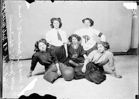 Women's basketball team, five players - Chicago Daily News, Inc.