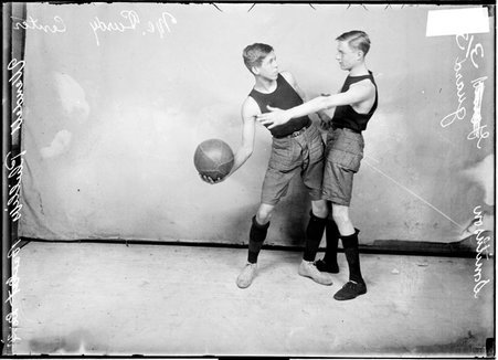 Basketball players, P. Smithson and McCurdy, Wendel Phillips High School - Chicago Daily News, Inc.