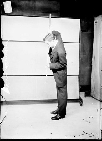 Billiards player, Dean Demarest, holding cue vertically - Chicago Daily News, Inc.