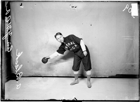 Indoor ball player, A. Black, Central YMCA, leaning to left with ball - Chicago Daily News, Inc.