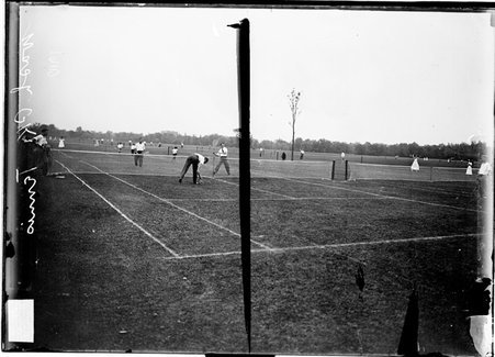 Tennis court, men and women playing in Washington Park - Chicago Daily News, Inc.