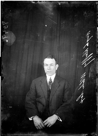 Baseball player, Hughy Duffy, Boston Red Sox, sitting indoors - Chicago Daily News, Inc.