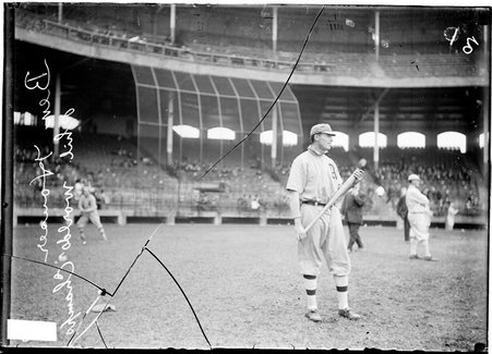 Baseball, Ben Houser, Philadelphia Athletics, standing on field holding bat - Chicago Daily News, Inc.