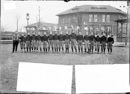 Wendell Phillips High School football team players standing on the grounds of the school - Chicago Daily News, Inc.