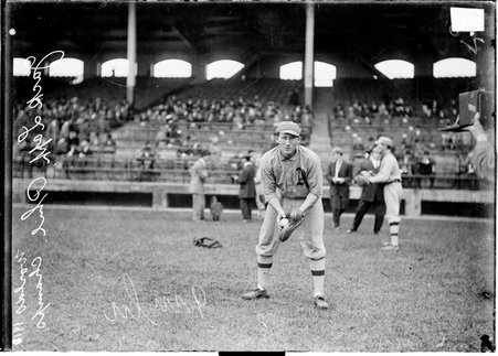 Baseball, World Series, Lapp bending forward holding a ball in his glove - Chicago Daily News, Inc.